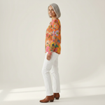 Faustine colourful floral patterned jumper in orange - side view