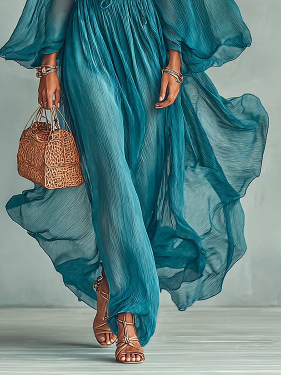 Woman wearing a statement sleeve pleated midi dress