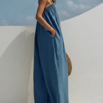 Woman wearing a wide-leg denim jumpsuit