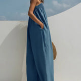 Woman wearing a wide-leg denim jumpsuit