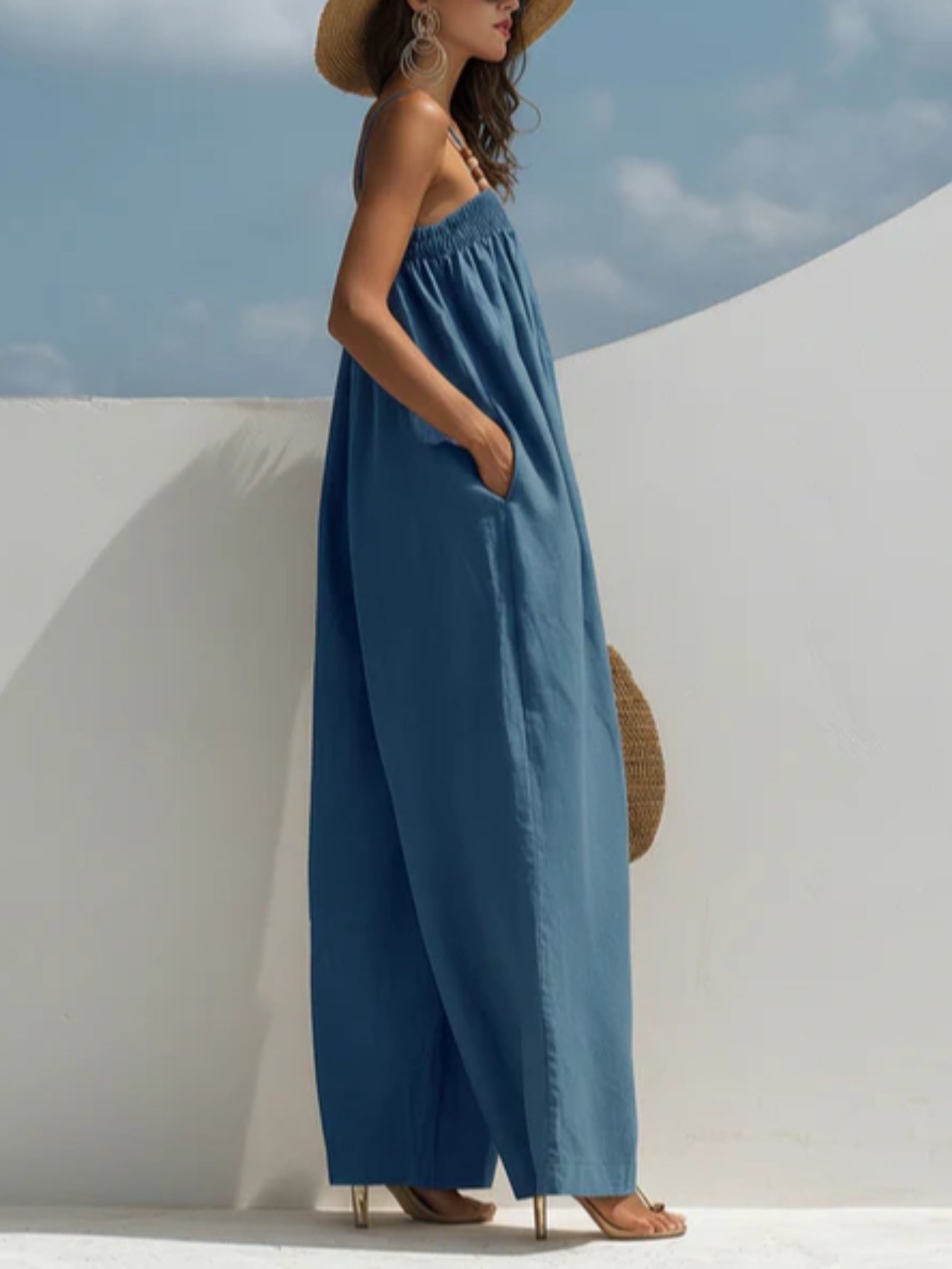 Woman wearing a wide-leg denim jumpsuit