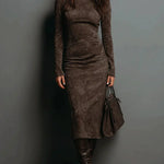 Woman wearing a suede-effect high-neck midi dress
