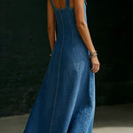 Woman wearing a long button-front denim dress