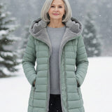 Woman wearing a fleece-lined quilted padded jacket with a shaped waist