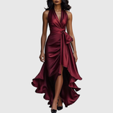 Woman wearing an evening wrap maxi dress with high slit