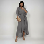 Woman wearing a V-neck chiffon dress