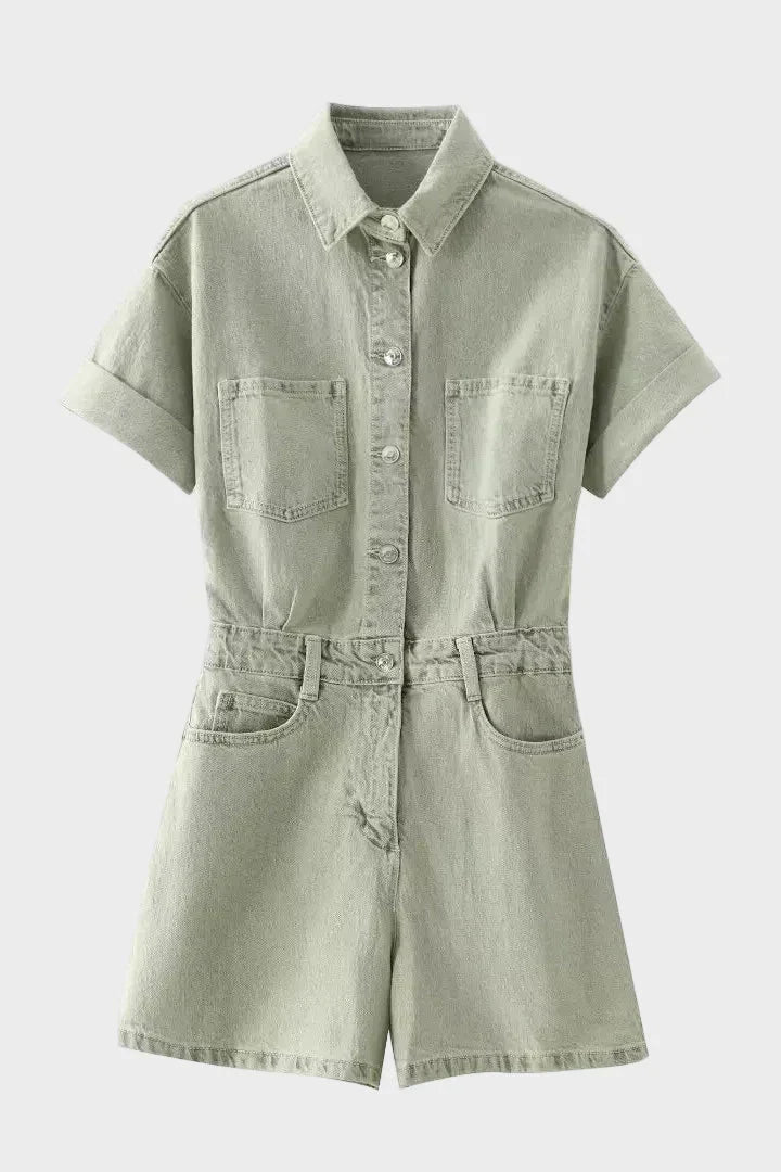 Woman wearing denim dungarees with a classic collar