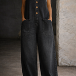 Woman wearing washed cotton dungarees with side pockets