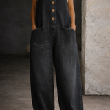Woman wearing washed cotton dungarees with side pockets