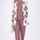Woman wearing an orchid three-piece cardigan, top and trousers co-ord set