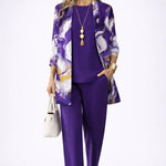Woman wearing a lilac three-piece cardigan, top and trousers co-ord set
