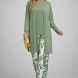 Woman wearing a green three-piece cardigan, top and trousers co-ord set