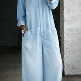 Woman wearing a long-sleeve off-shoulder denim jumpsuit
