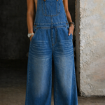 Woman wearing an elastic-waist denim all-in-one with a Peter Pan collar