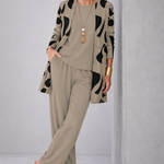 Woman wearing a khaki three-piece cardigan set with wide-leg trousers