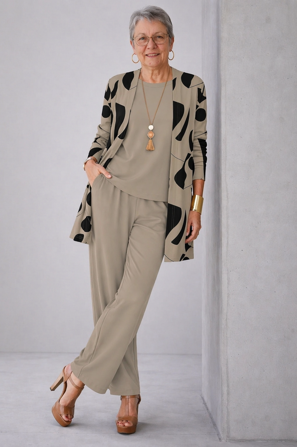 Woman wearing a khaki three-piece cardigan set with wide-leg trousers