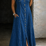 Woman wearing a plus-size sleeveless denim shirt dress