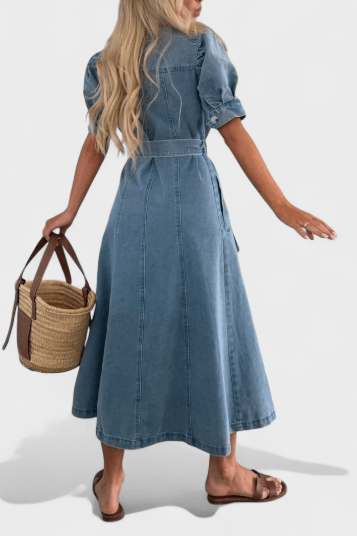Woman wearing a midi button-front shirt dress with a tie belt