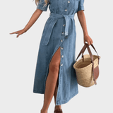 Woman wearing a midi button-front shirt dress with a tie belt