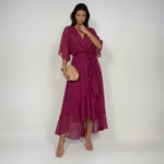 Woman wearing a V-neck chiffon dress