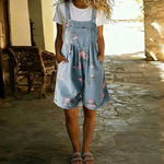 Woman wearing a floral-print denim jumpsuit