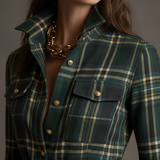 Woman wearing a belted plaid shirt dress with structured collar and flared skirt