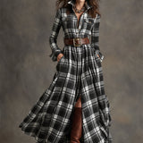 Woman wearing a belted plaid shirt dress with structured collar and flared skirt
