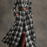 Woman wearing a belted plaid shirt dress with structured collar and flared skirt
