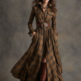 Woman wearing a belted plaid shirt dress with structured collar and flared skirt