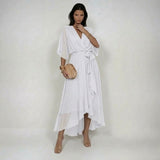 Woman wearing a V-neck chiffon dress