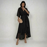 Woman wearing a V-neck chiffon dress