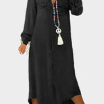 Woman wearing a long button-through denim dress