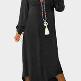 Woman wearing a long button-through denim dress