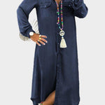 Woman wearing a long button-through denim dress