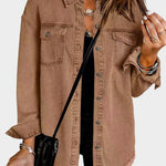 Classic denim jacket with button front and fringed hem