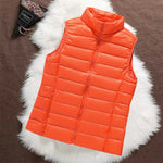 Woman wearing an orange padded gilet