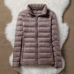 Champagne lightweight padded jacket with a feminine fit