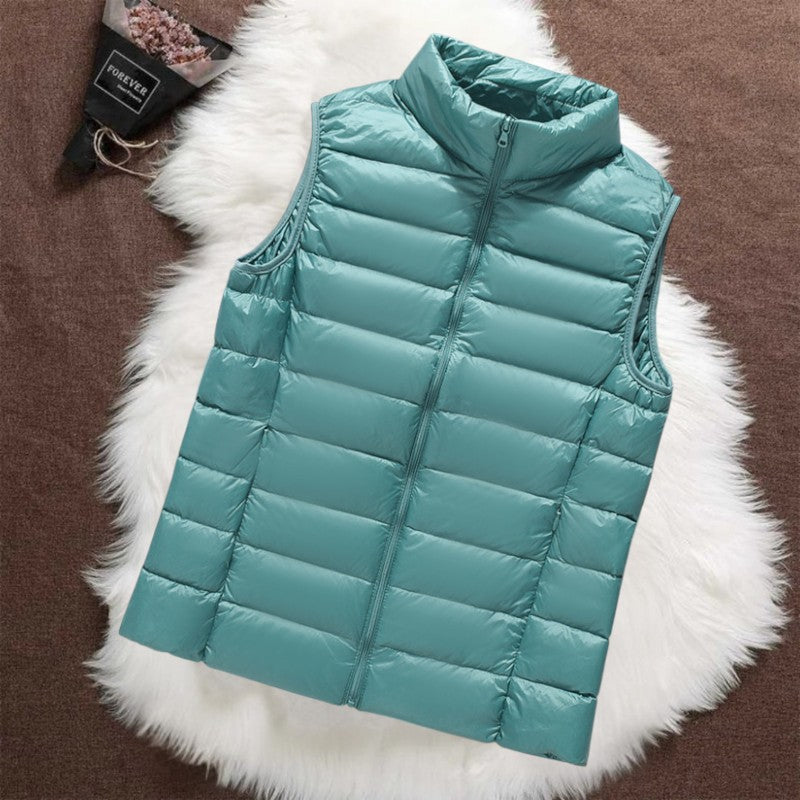 Woman wearing a mint green padded gilet