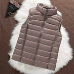 Woman wearing a champagne padded gilet