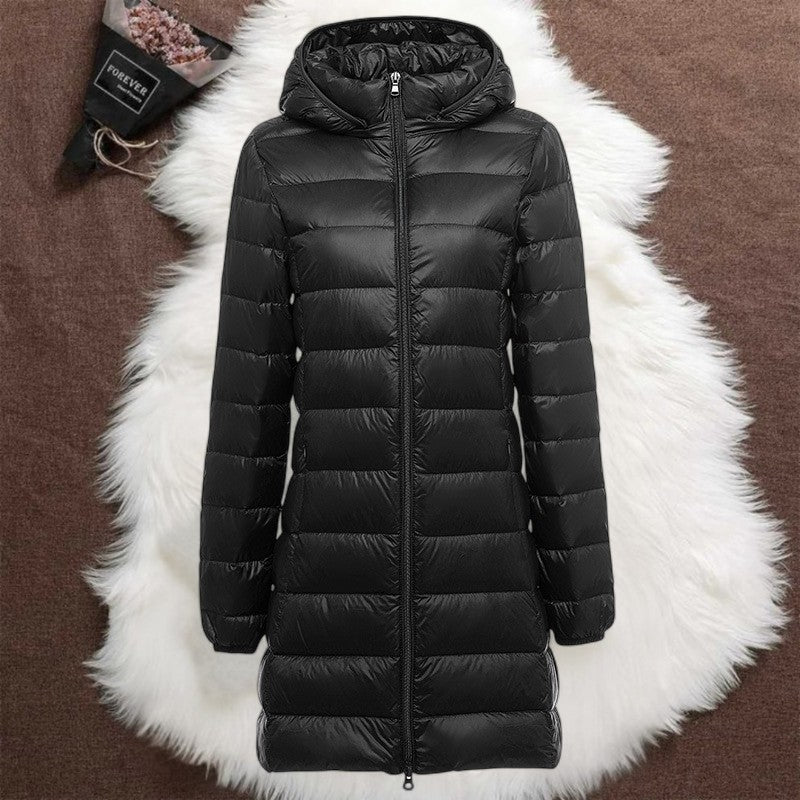 Woman wearing a black long padded jacket