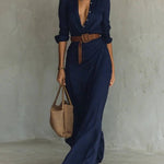 Woman wearing a wrap-style maxi dress with belt