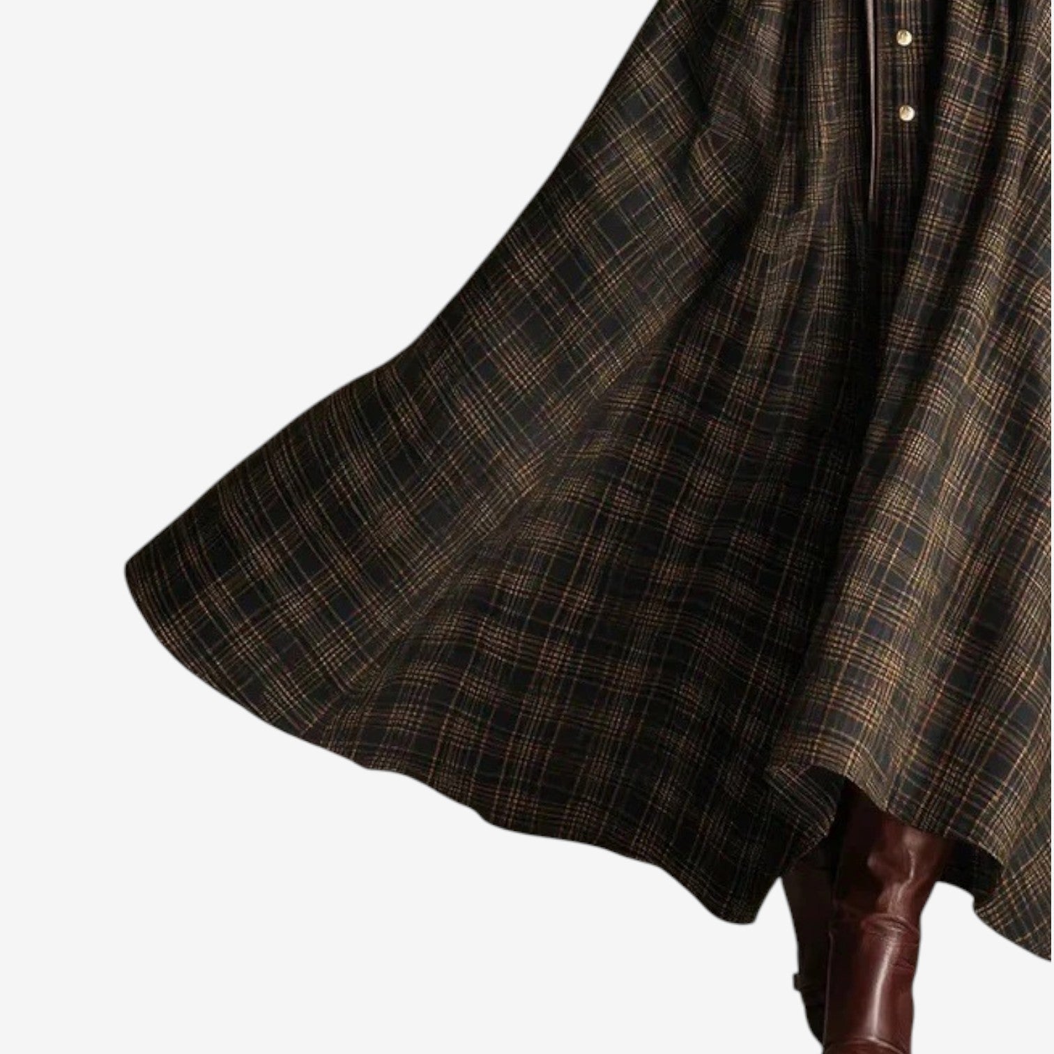 Woman wearing a belted vintage plaid maxi dress