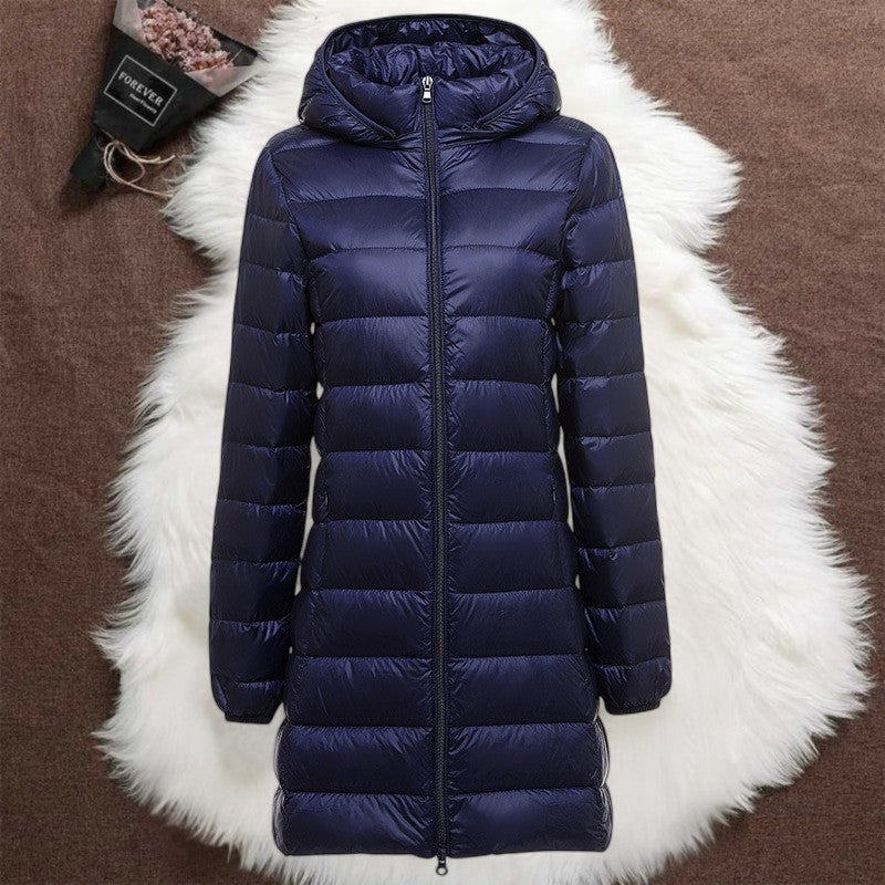 Navy blue long padded jacket with a removable hood