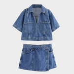 Woman wearing a denim two-piece set with short top and mini skirt
