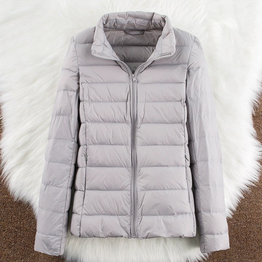 Grey lightweight padded jacket with a feminine fit