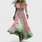 Woman wearing a floral embroidered maxi dress