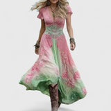 Woman wearing a floral embroidered maxi dress