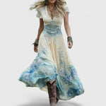 Woman wearing a floral embroidered maxi dress