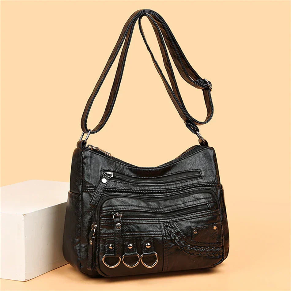 Multi-Zip Shoulder Bag by Eleanor Vale