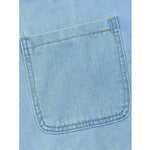 Woman wearing a relaxed denim dress